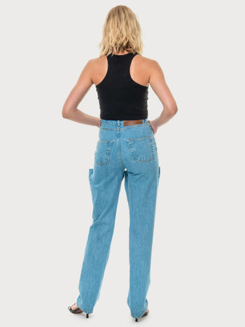 Wader Jeans With A Knee Cut