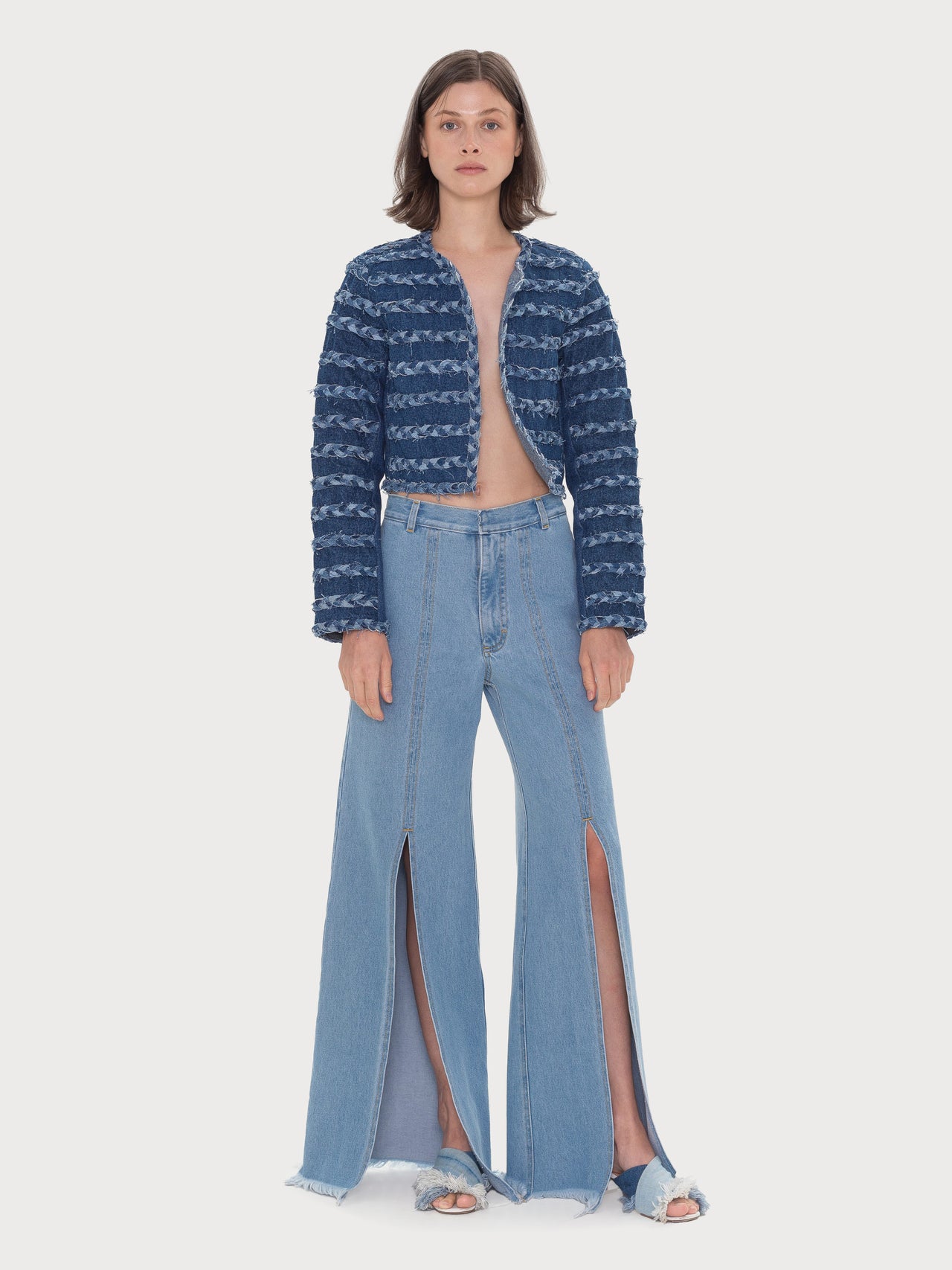 Buy Front Splits Flared Jeans – Bottoms by Ksenia Schnaider | Ethical & Sustainable Fashion