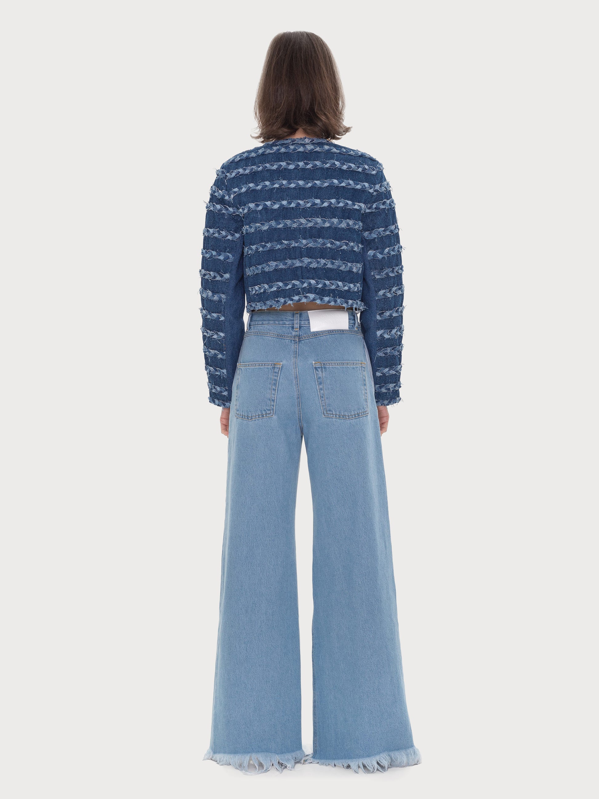 Buy Front Splits Flared Jeans – Bottoms by Ksenia Schnaider | Ethical & Sustainable Fashion